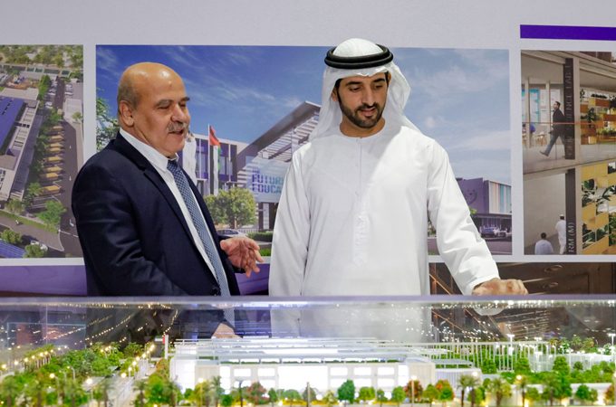  HH Sheikh Hamdan is briefed on the initiative by Mirwais Azizi (left)